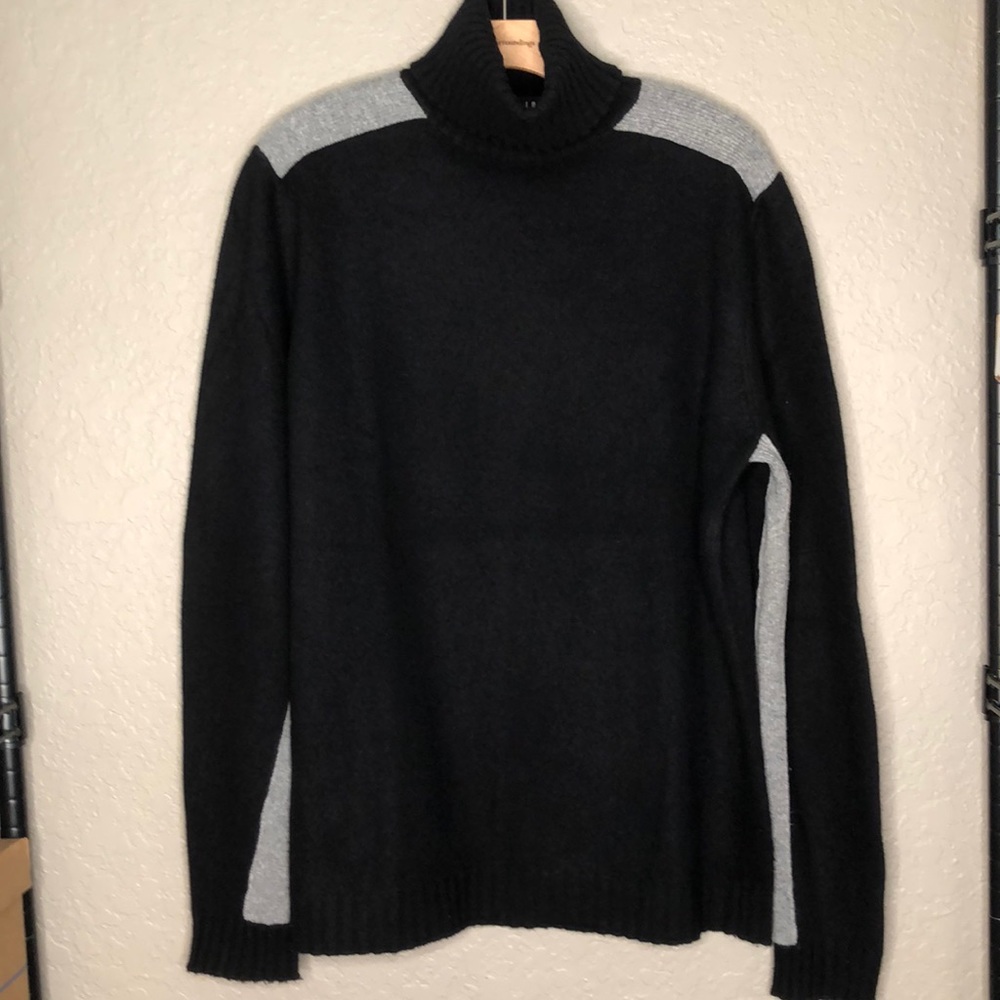 Dunhill black 100% Marino wool turtleneck with gray trim. Made in Italy